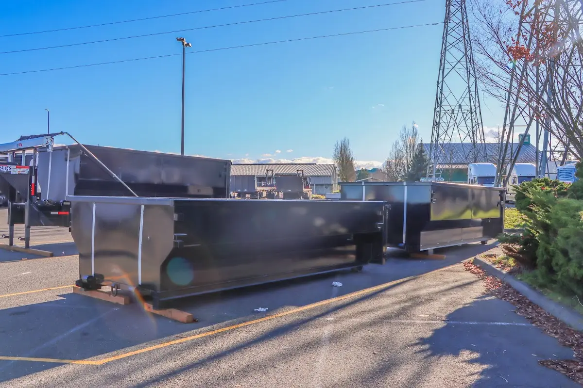 Roll-off dumpster ready for waste disposal at job site for Construction Dumpster Rental in Mason